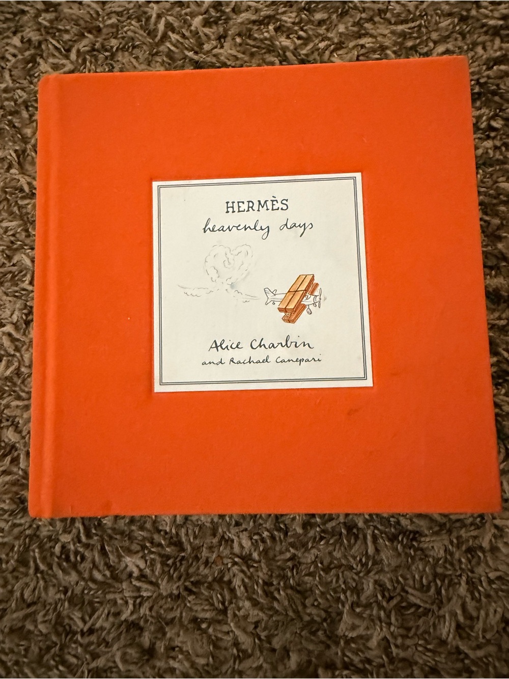 Hermès "Heavenly Days" Orange Hardcover Book